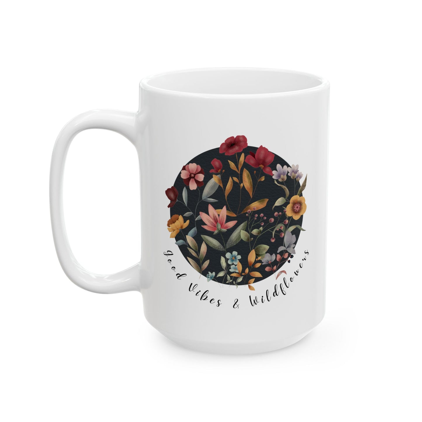 Good Vibes & Wildflowers Ceramic Mug, featuring a vibrant circle of wildflowers on a navy background. Available in 15oz