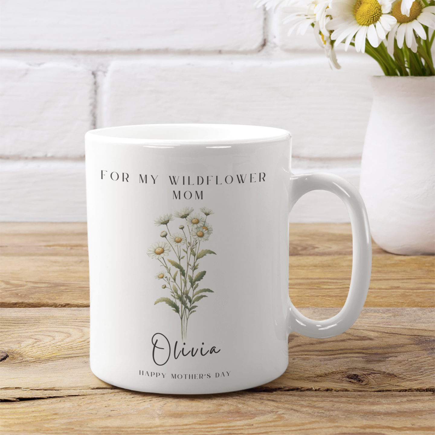 Personalized Wildflower Birth Month Mother's Day Mug, showcasing a sample design with Month-Flower and a personalized name and message, on a white ceramic mug. Available in 11oz and 15oz.