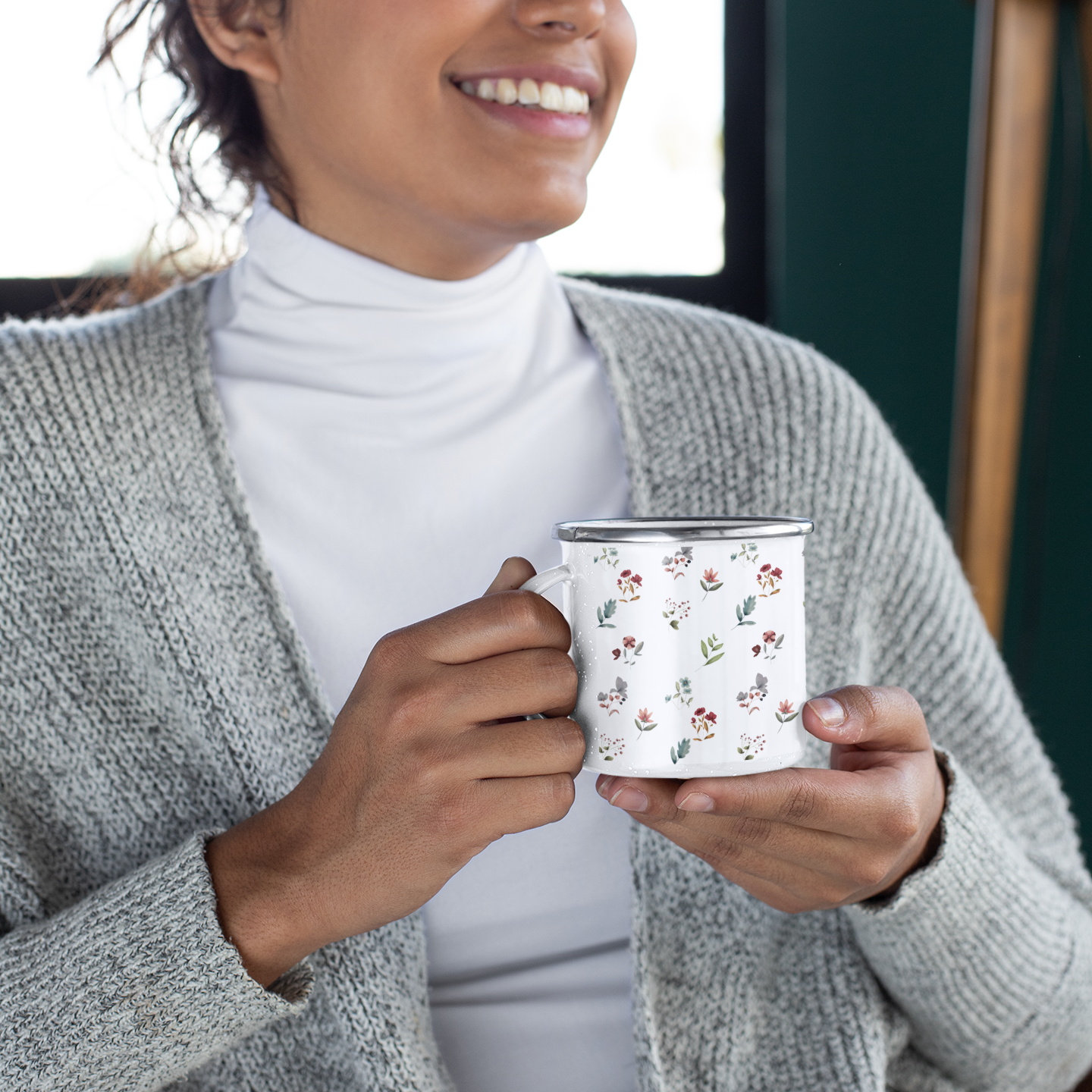 Enamel mug with a floral design