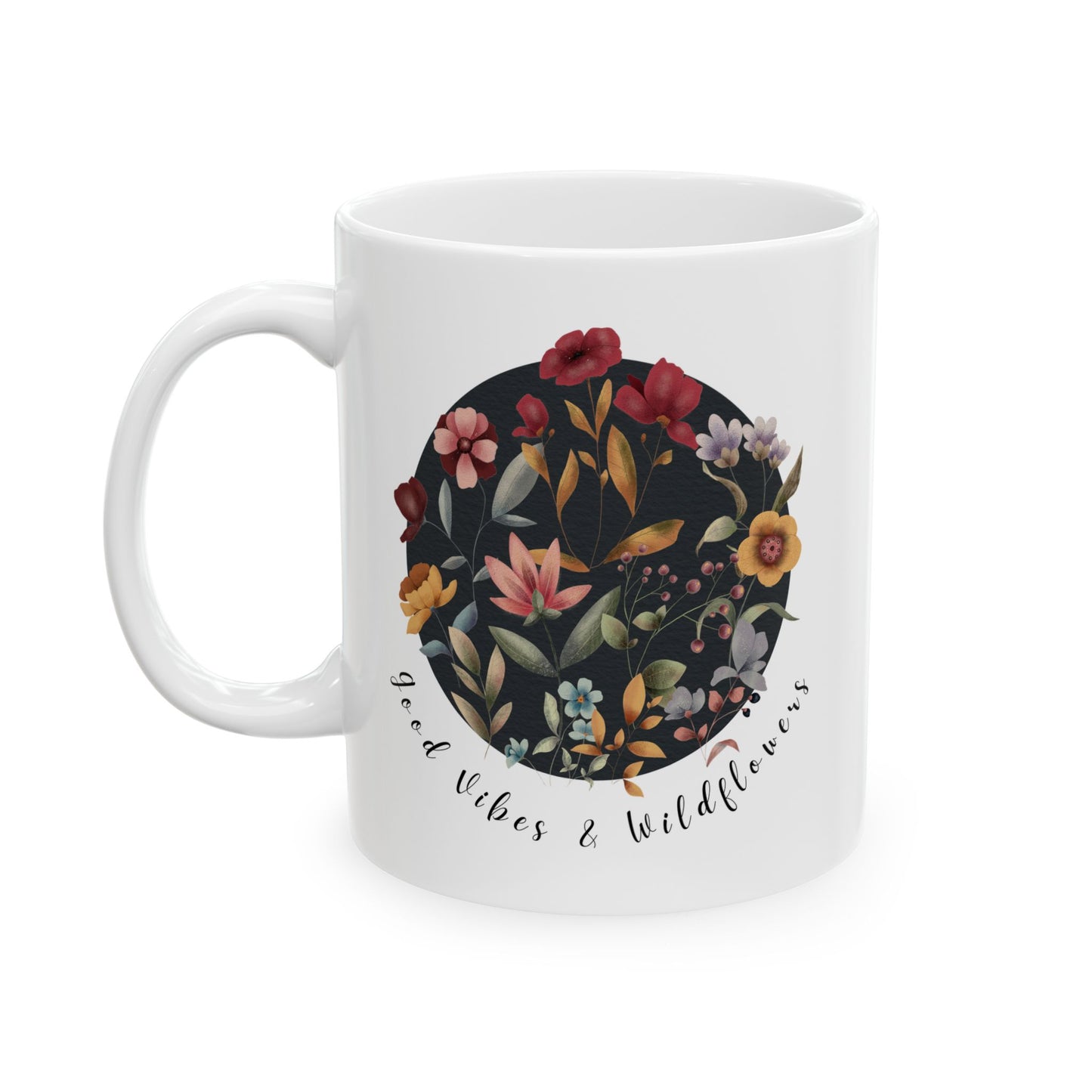 Good Vibes & Wildflowers Ceramic Mug, featuring a vibrant circle of wildflowers on a navy background. Available in 11oz