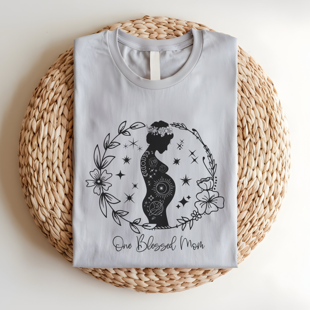 Flat lay of the "One Blessed Mom" T-Shirt, highlighting the soft Airlume cotton fabric and classic crew neckline.Heather Dust Grey