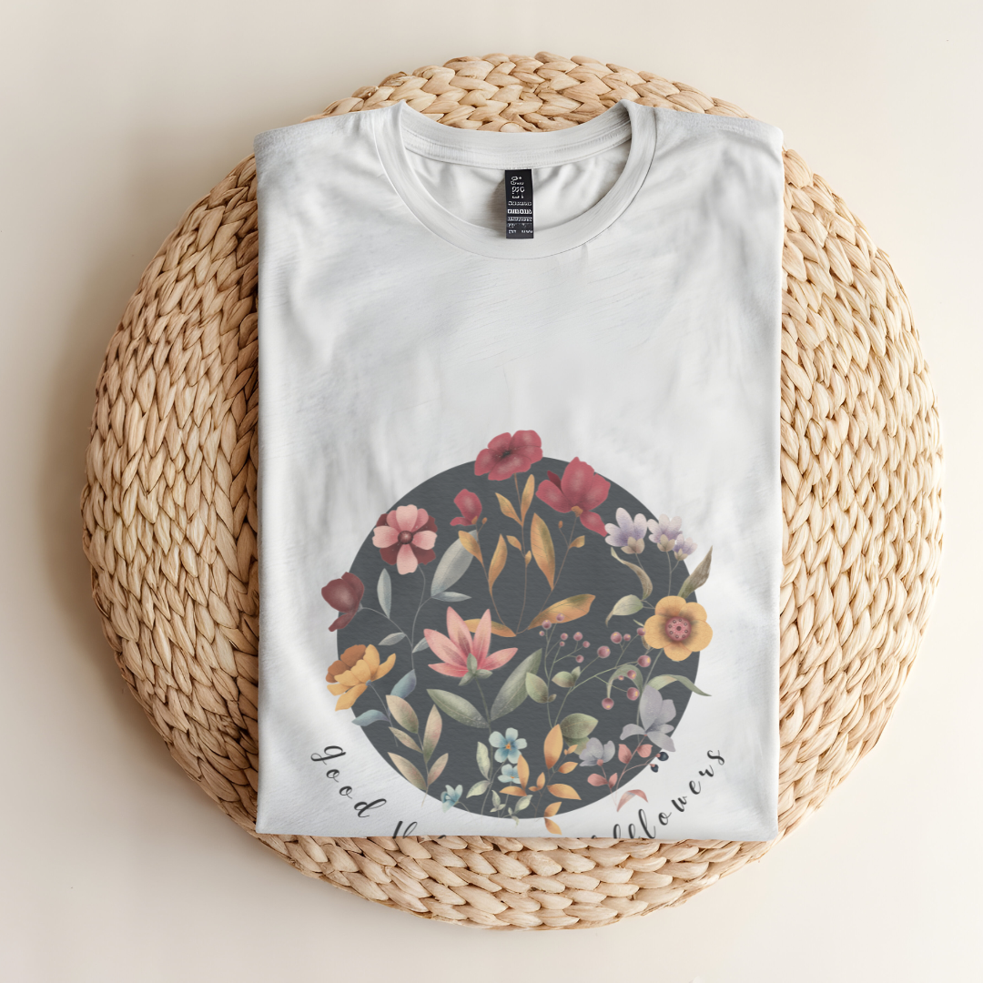 Flat lay of the "Hello Spring: Good Vibes & Wildflowers" Tee, highlighting the soft, 100% US cotton fabric, classic crew neck, and the beautiful botanical floral design.