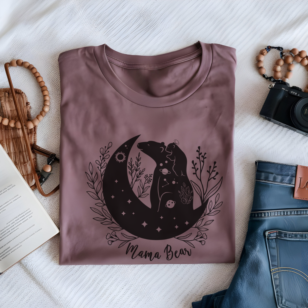 Folded "Mamma Bear" T-Shirt, highlighting the soft Airlume cotton fabric and classic crew neckline. Mauve