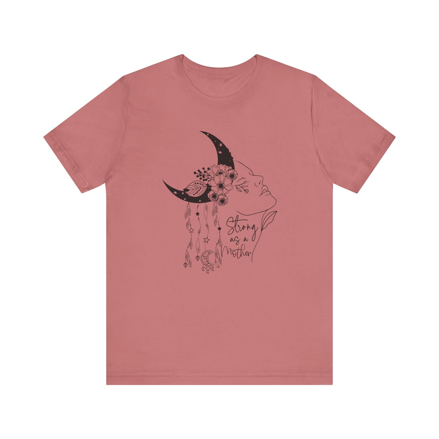 Flat lay of the "Strong as a Mother" T-Shirt, highlighting the soft Airlume cotton fabric and classic crew neckline. Color Mauve The graphic is clearly visible, showing the woman's profile, crescent moon, flowers, and charms in detail.