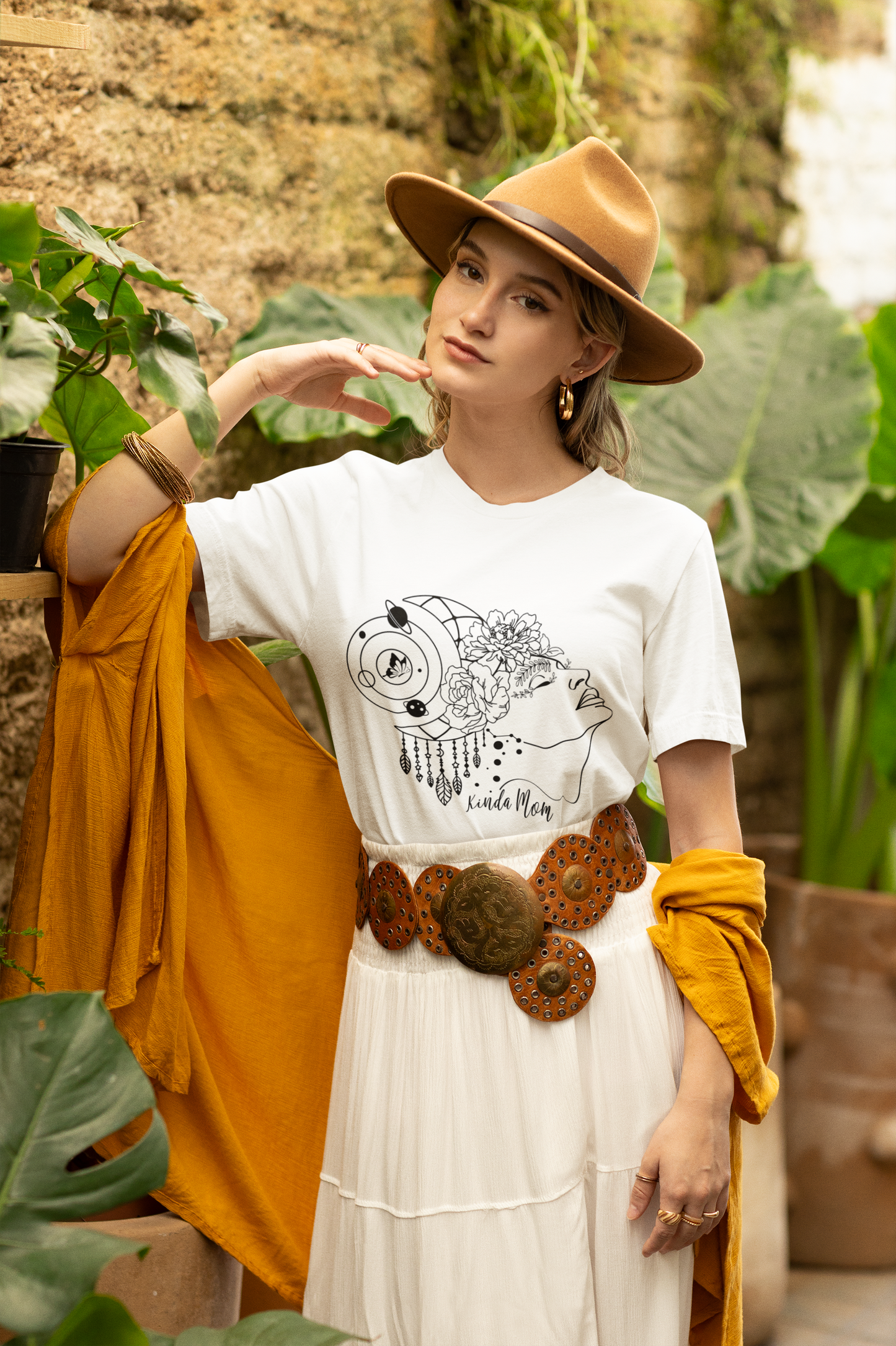 "Kinda Mom" Unisex Jersey T-Shirt, featuring the funny "Kinda Mom" design, modeled bya Womanwearing size M.