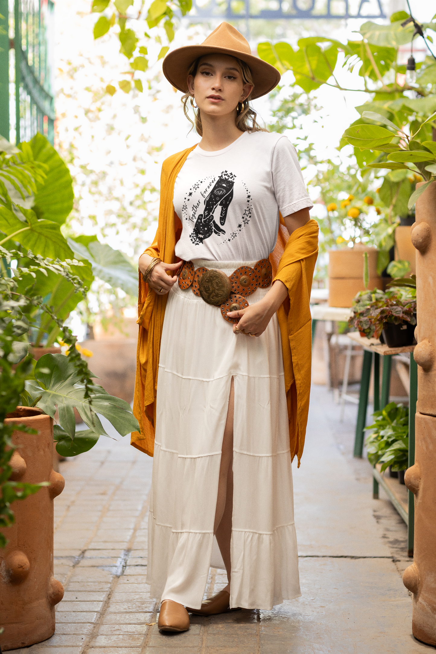 "Together Forever" Mother's Day Unisex Jersey T-Shirt, featuring both hands (mother & son) in a starring circle design, modeled by woman wearing size M