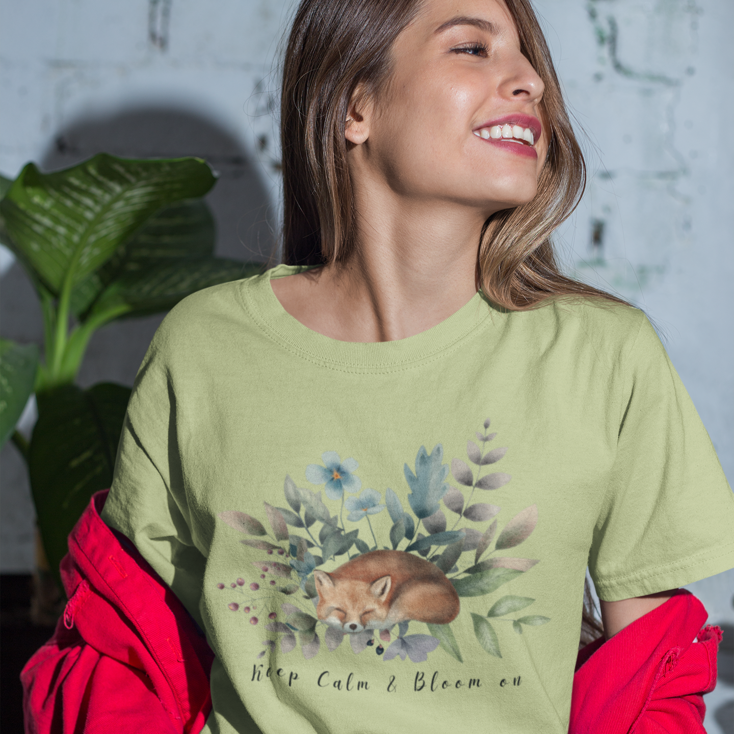 Lifestyle shot of a person wearing the "Keep Calm & Bloom On" T-Shirt while