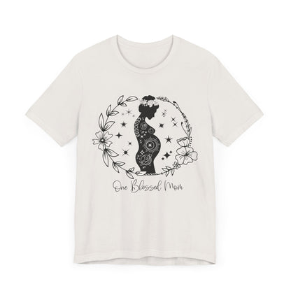Flat lay of the "One Blessed Mom" T-Shirt, highlighting the soft Airlume cotton fabric and classic crew neckline. White vintage