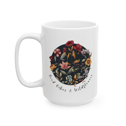 Good Vibes & Wildflowers Ceramic Mug, featuring a vibrant circle of wildflowers on a navy  background. Available in 15oz 