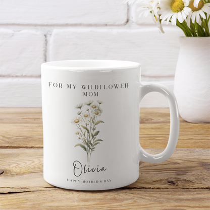 Personalized Wildflower Birth Month Mother's Day Mug, showcasing a sample design with Month-Flower and a personalized name and message, on a white ceramic mug. Available in 11oz and 15oz.
