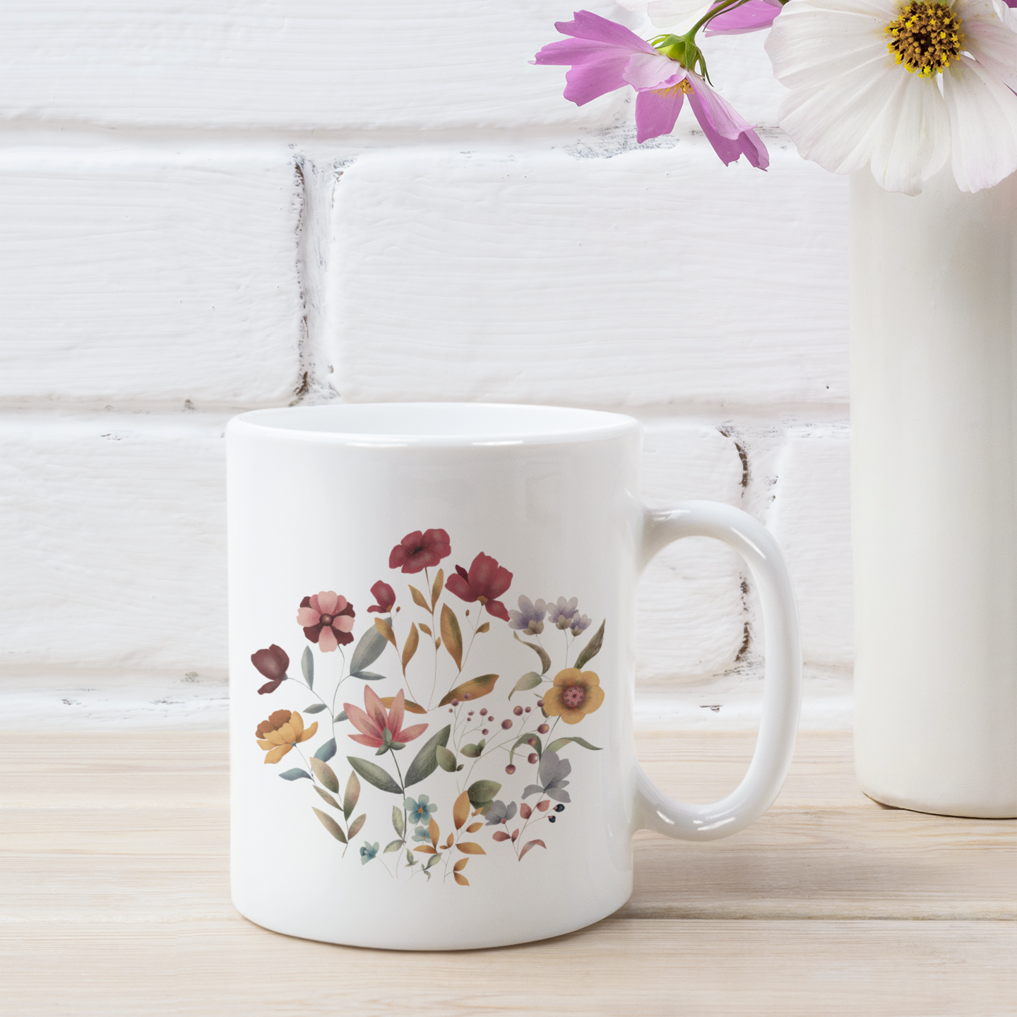 Wildflowers Circle Ceramic Mug, showcasing a vibrant circular arrangement of wildflowers on a white ceramic background. Available in 11oz and 15oz sizes.