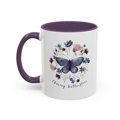 Close-up view of the intricate butterfly and wildflower design on the Butterfly & Wildflower Accent Coffee Mug, showcasing the vibrant colors and delicate details.