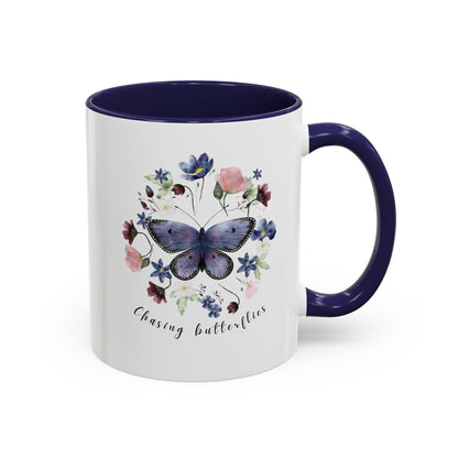 Close-up view of the intricate butterfly and wildflower design on the Butterfly & Wildflower Accent Coffee Mug, showcasing the vibrant colors and delicate details.