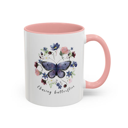 Close-up view of the intricate butterfly and wildflower design on the Butterfly & Wildflower Accent Coffee Mug, showcasing the vibrant colors and delicate details.