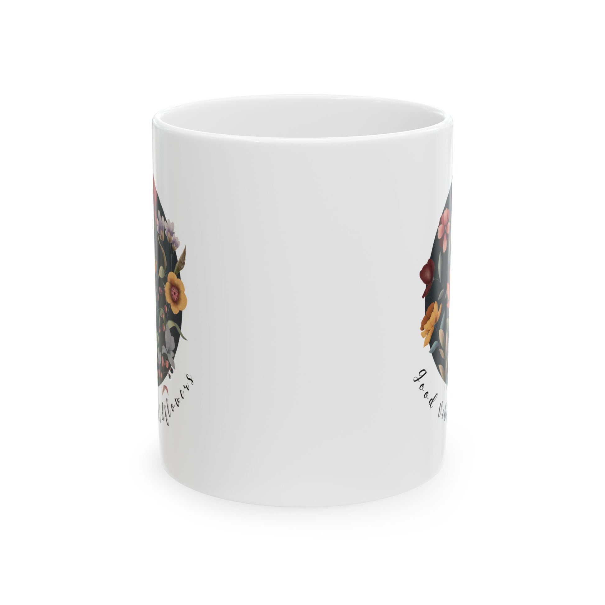 Good Vibes & Wildflowers Ceramic Mug, featuring a vibrant circle of wildflowers on a navy  background. Available in 11oz 