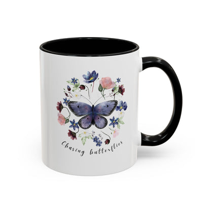 Close-up view of the intricate butterfly and wildflower design on the Butterfly & Wildflower Accent Coffee Mug, showcasing the vibrant colors and delicate details.