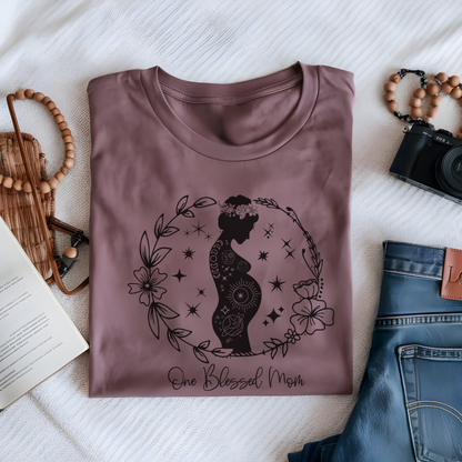 Flat lay of the "One Blessed Mom" T-Shirt, highlighting the soft Airlume cotton fabric and classic crew neckline. Mauve