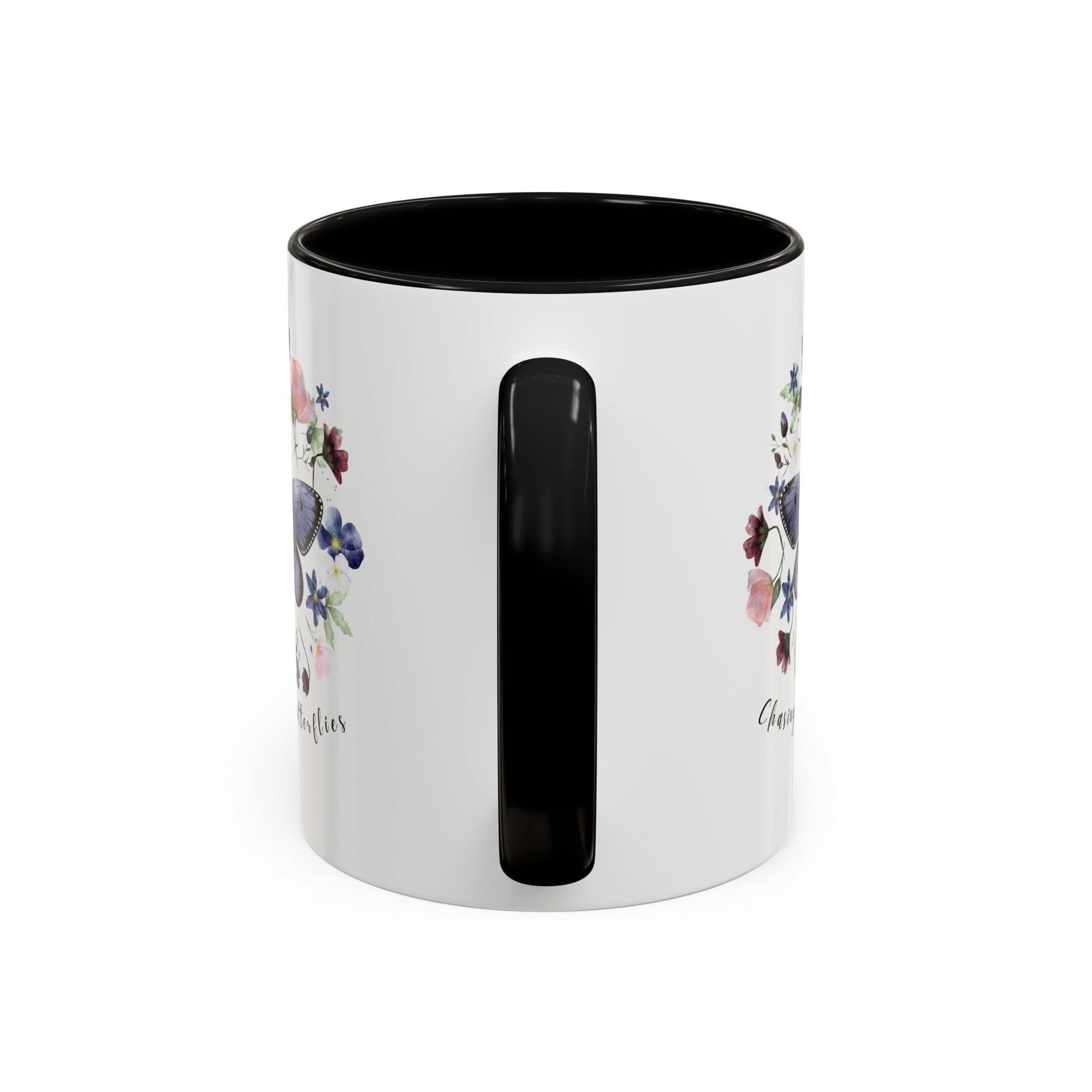 Close-up view of the intricate butterfly and wildflower design on the Butterfly & Wildflower Accent Coffee Mug, showcasing the vibrant colors and delicate details.