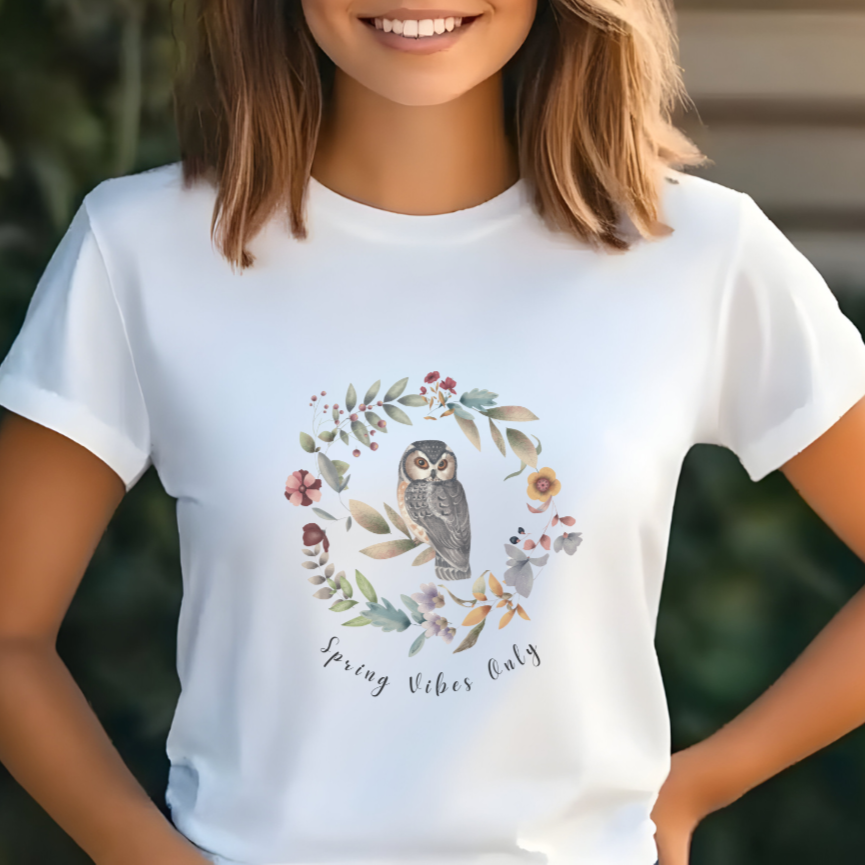 Close-up view of the "Spring Vibes Only" graphic, showcasing the delicate watercolor textures of the owl's feathers, the intricate details of the flower petals and leaves in the wreath, and the whimsical typography of the "Spring Vibes Only" text.