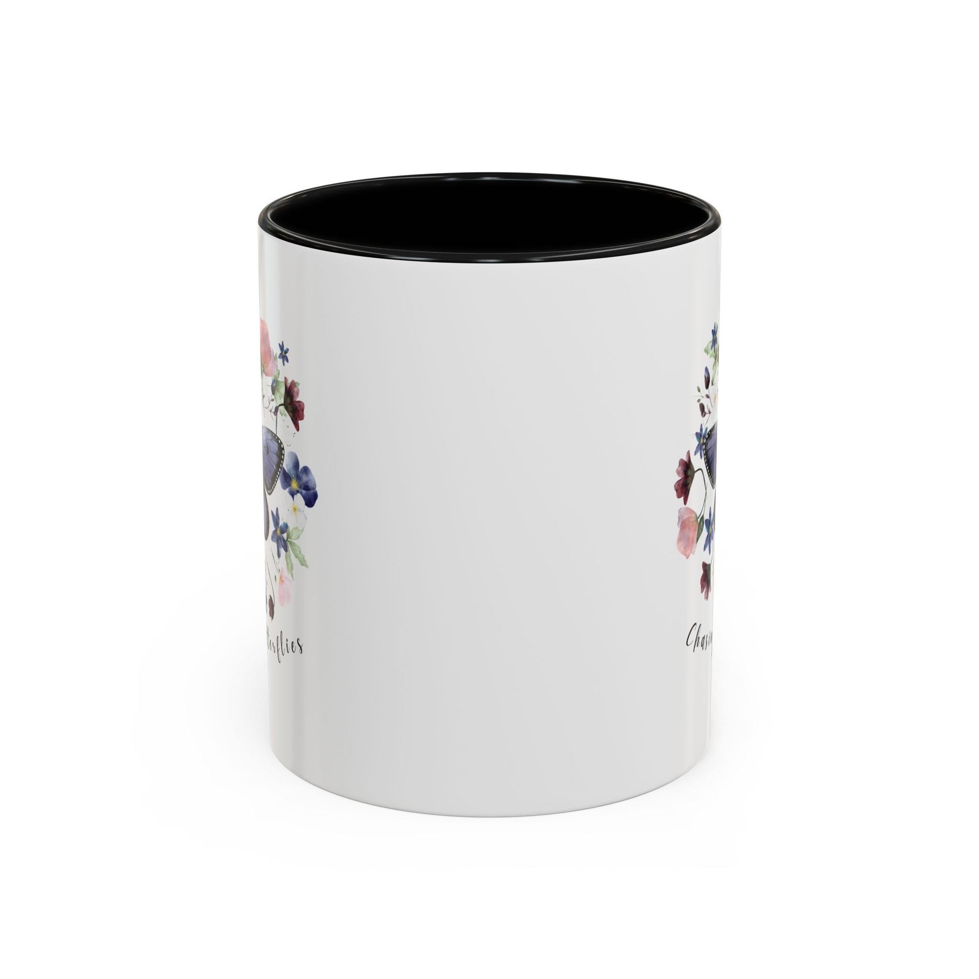 Close-up view of the intricate butterfly and wildflower design on the Butterfly & Wildflower Accent Coffee Mug, showcasing the vibrant colors and delicate details.
