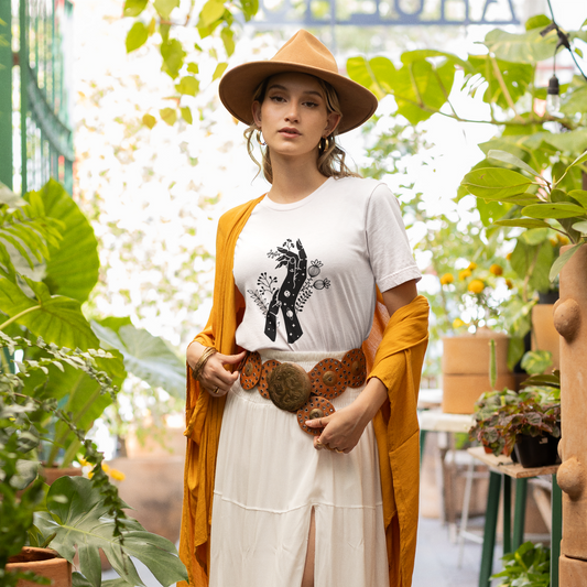 Lifestyle shot of a mom wearing the Mystic Mother T-Shirt, showing how it can be styled for everyday wear