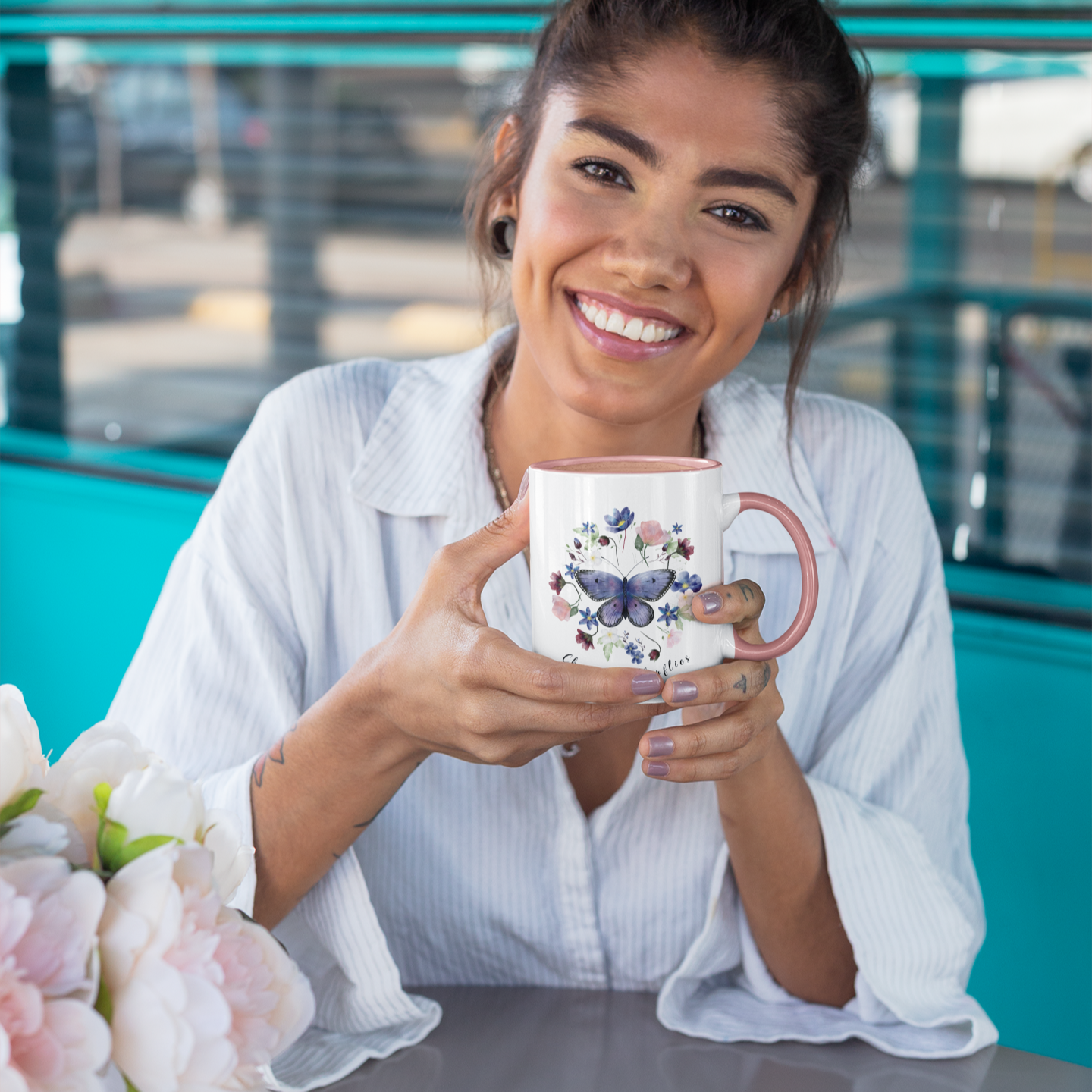  Lifestyle shot of the Butterfly & Wildflower Accent Coffee Mug filled with coffee, showing the comfortable C-shaped handle and the perfect size for enjoying your favorite beverage.