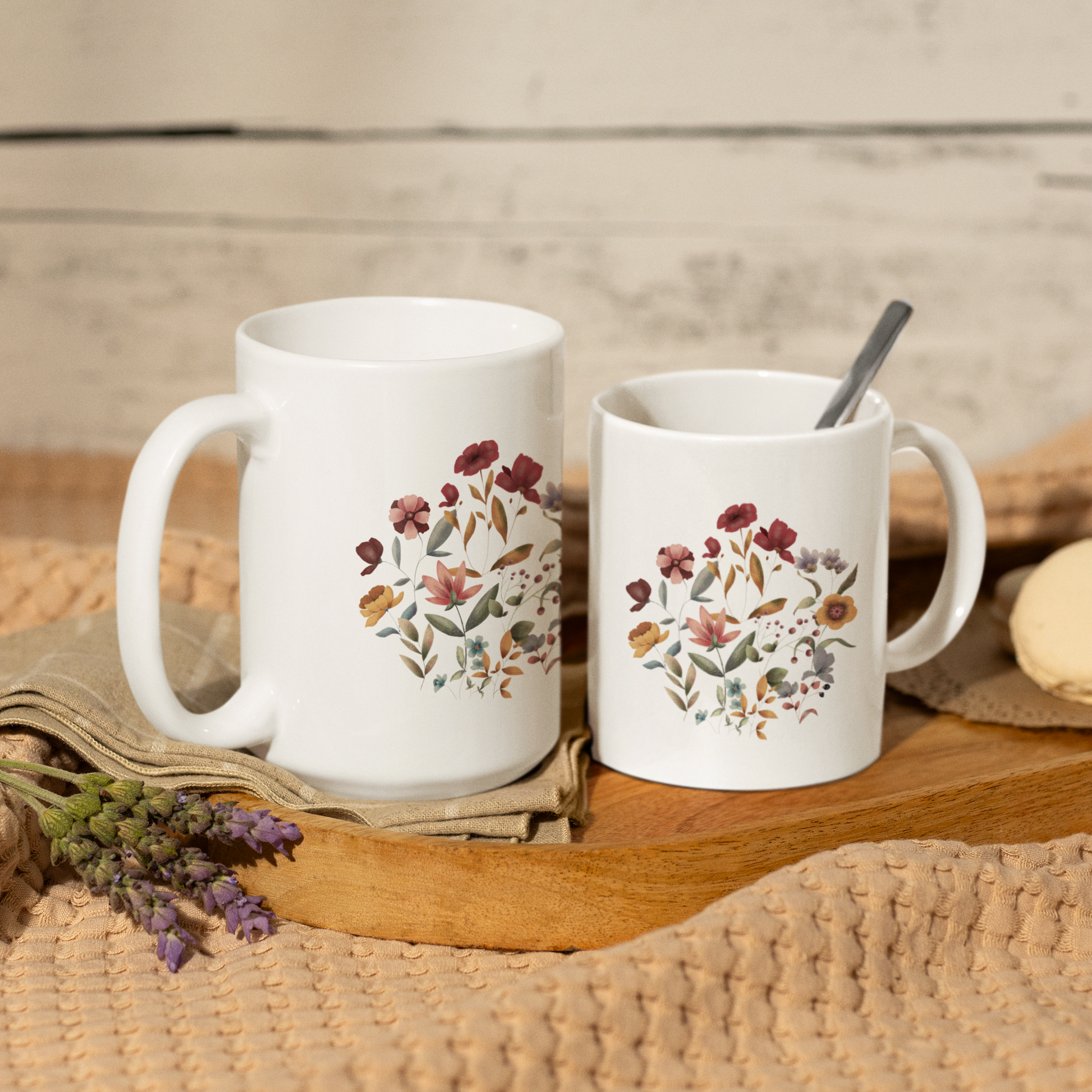  Comparison of the 11oz and 15oz sizes of the Wildflowers Circle Ceramic Mug, clearly showing the size difference and capacity.