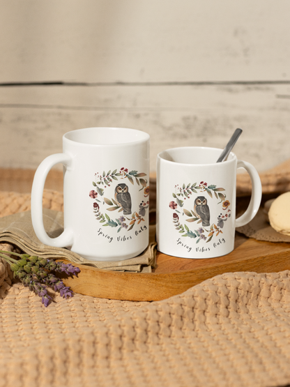 Comparison of the 11oz and 15oz sizes of the Bloom On Coffee Mug, clearly illustrating the size difference and capacity.