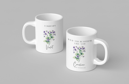 Personalized Wildflower Birth Month Mother's Day Mug, showcasing a sample design with a [February- Violet] and a personalized name and message, on a white ceramic mug. Available in 11oz and 15oz.